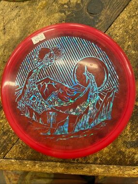 Innova Red Decorative Disc golf with Iridescent Blue Graphic